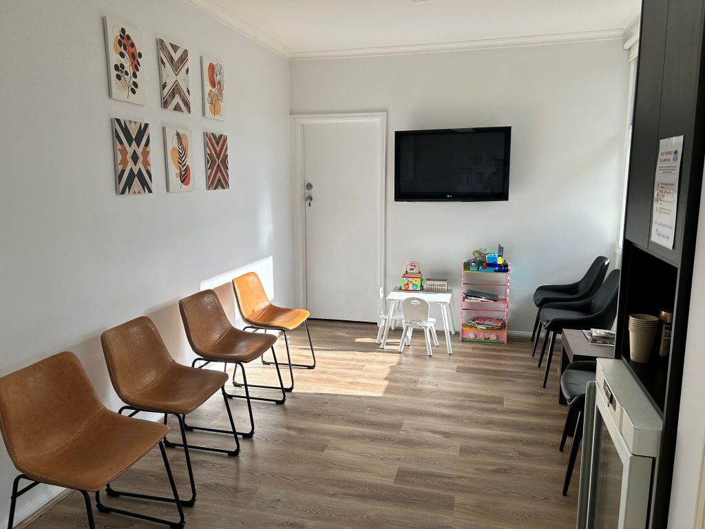 Waiting room shows kids play equipment and books